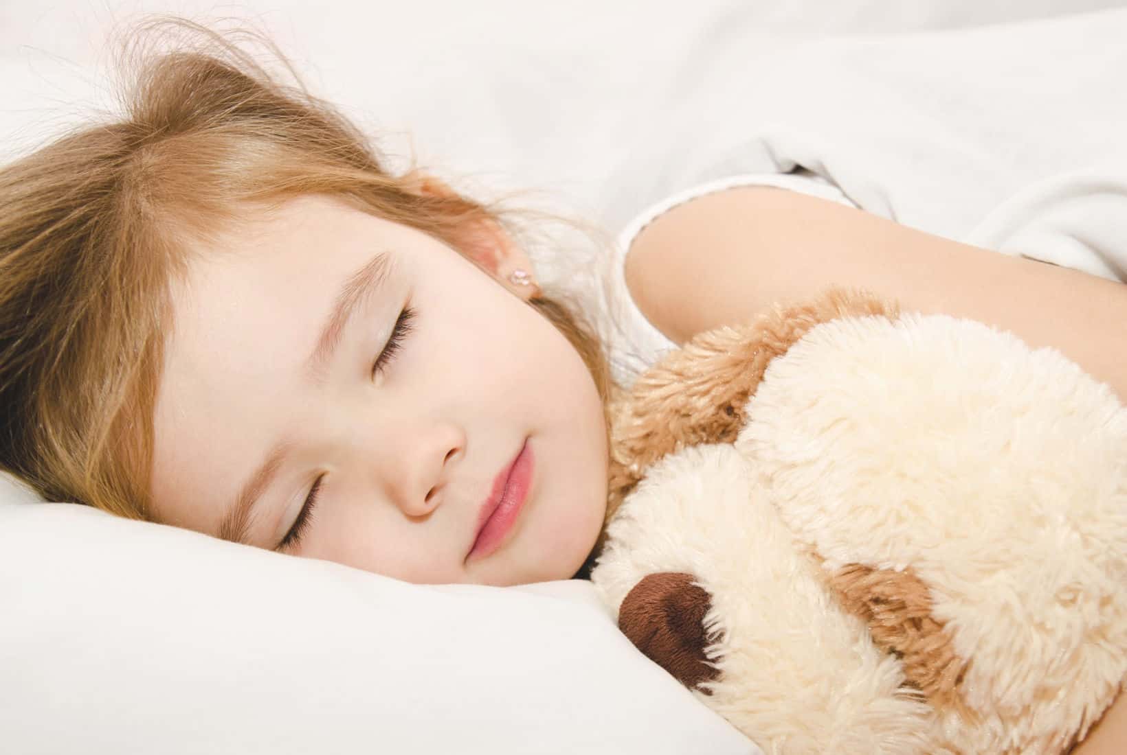 How to make a child sleep in their own bed top